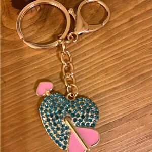 Blue heart covered in rhinestones with enamel pink heart arrow bag tag/keychain